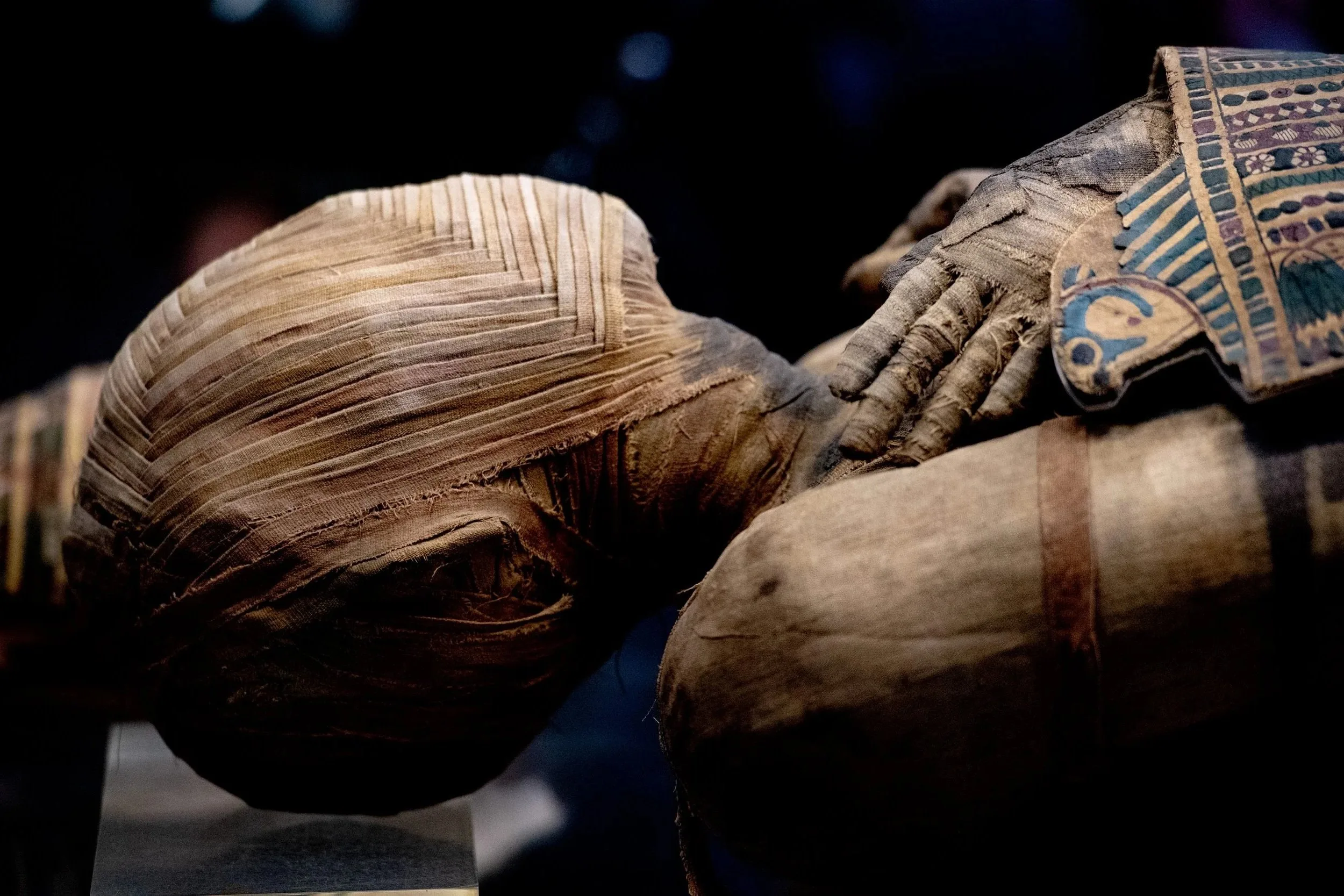 Stone tomb doorway partly in shadow